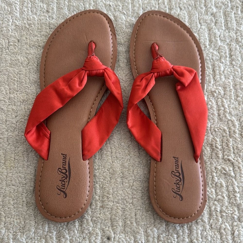 Lucky brand orange sandals.